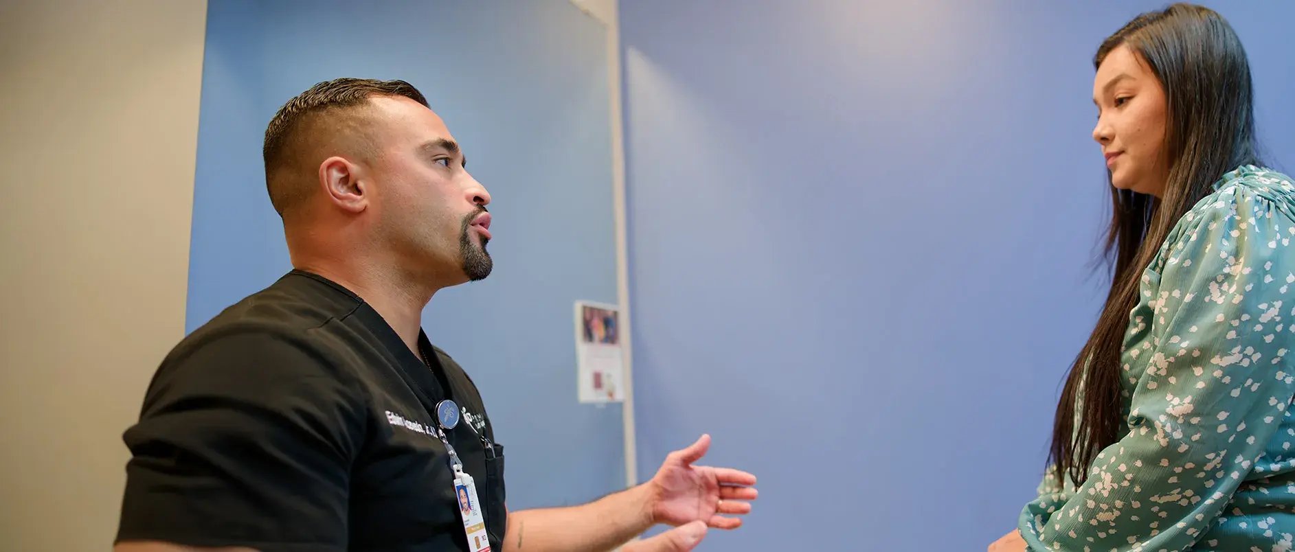 doctor-talking-to-female-patient-with-long-dark-hair